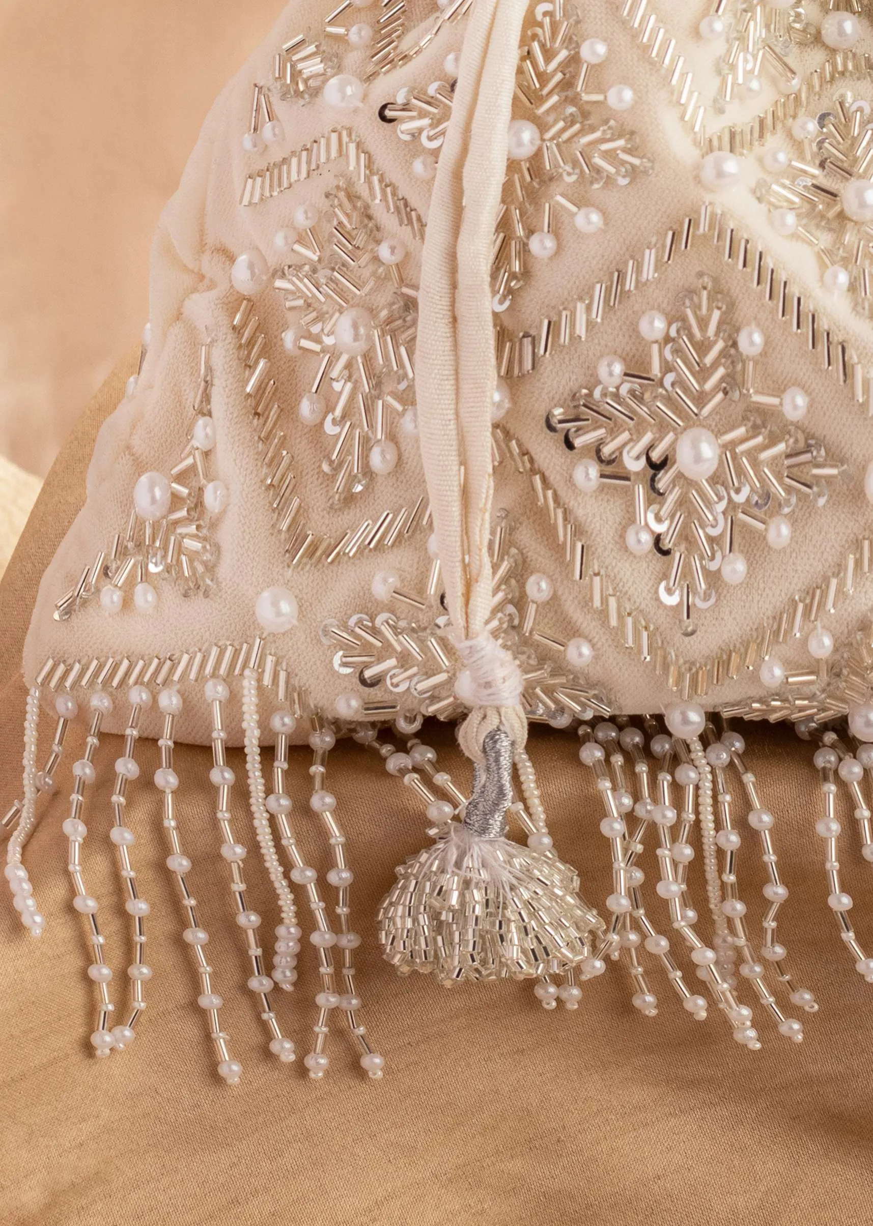Ivory White Hand Embroidered Potli In Velvet