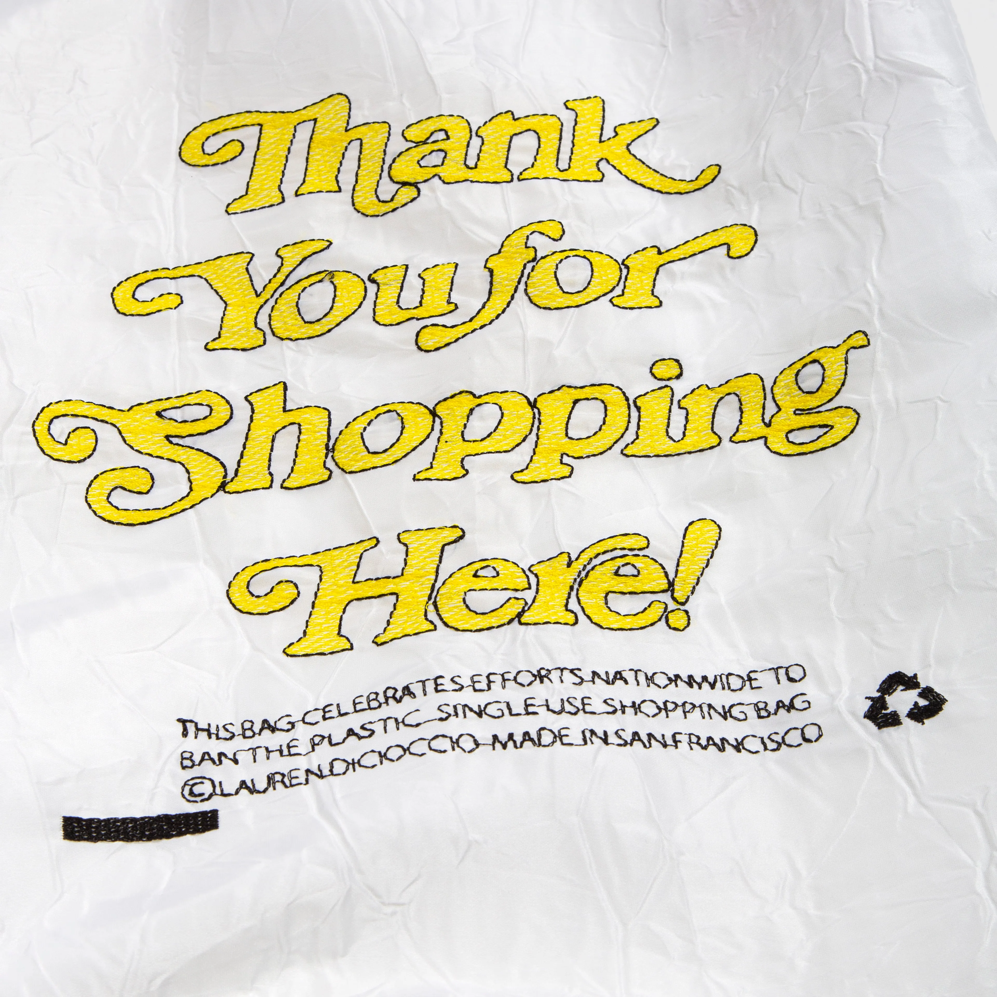SHOPPING / Yellow & Black Thread on White Fabric